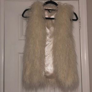 White fur vest